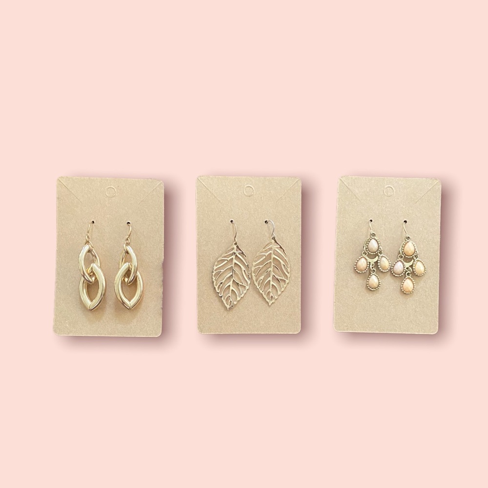 Three pairs gold tone dangle earrings